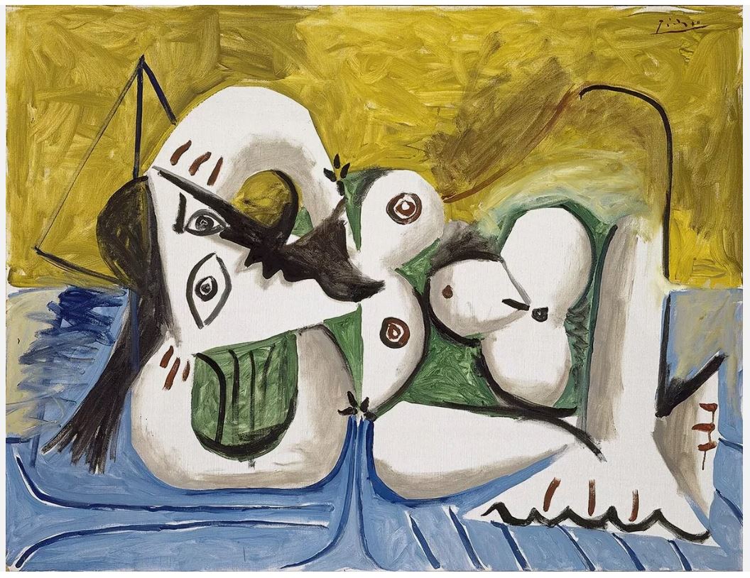 Woman Reclining on a Blue Sofa